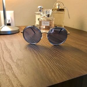 Blue aviator style sunglasses